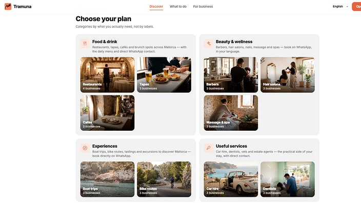 Web de Tramuna: las categorías del directorio de Mallorca —comer y beber, belleza, experiencias y servicios— con foto y número de negocios en cada una.